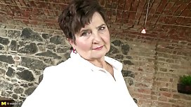 Nerdy slut masturbates with the control of the console